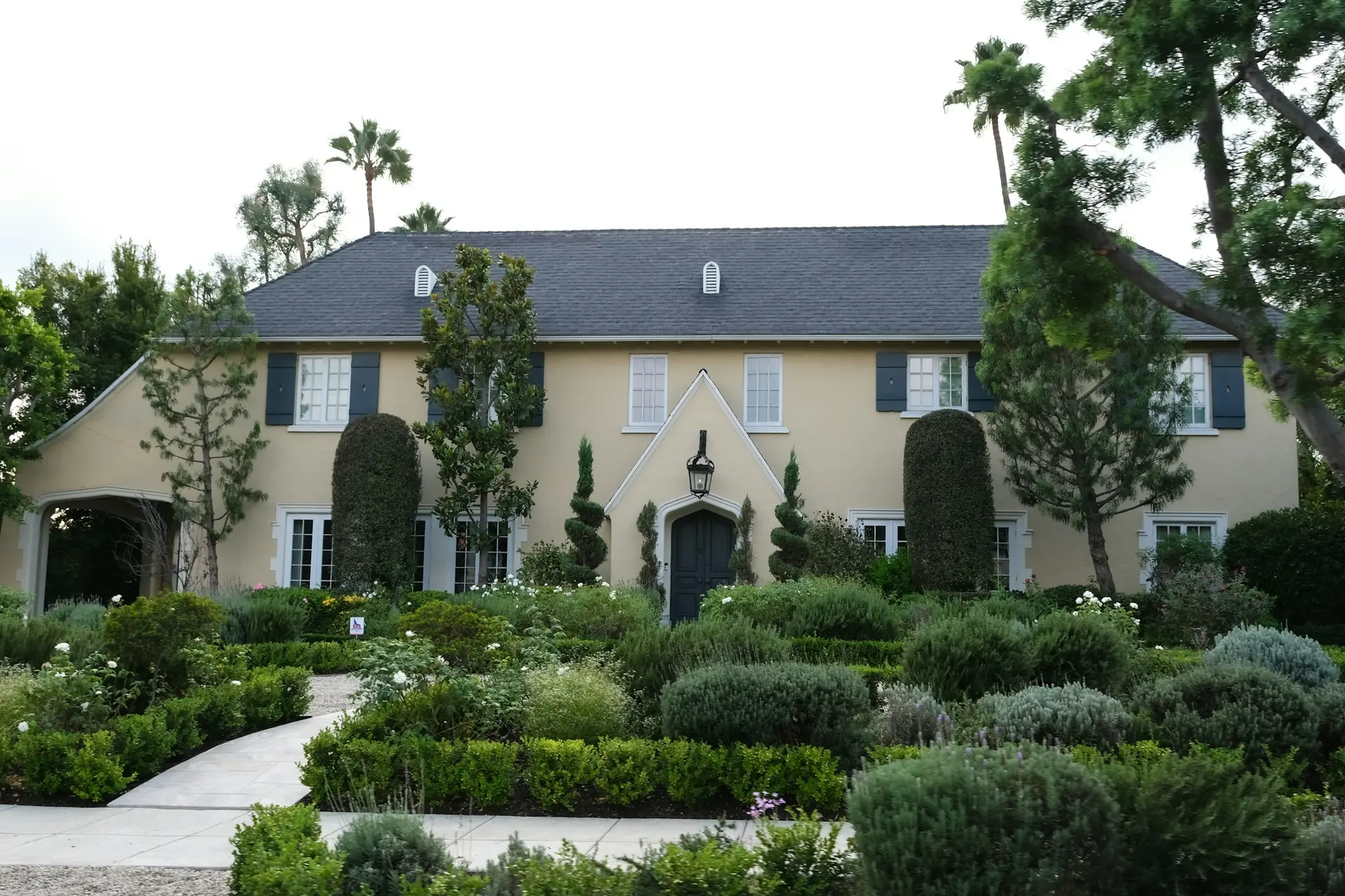 Well-maintained home with manicured gardens