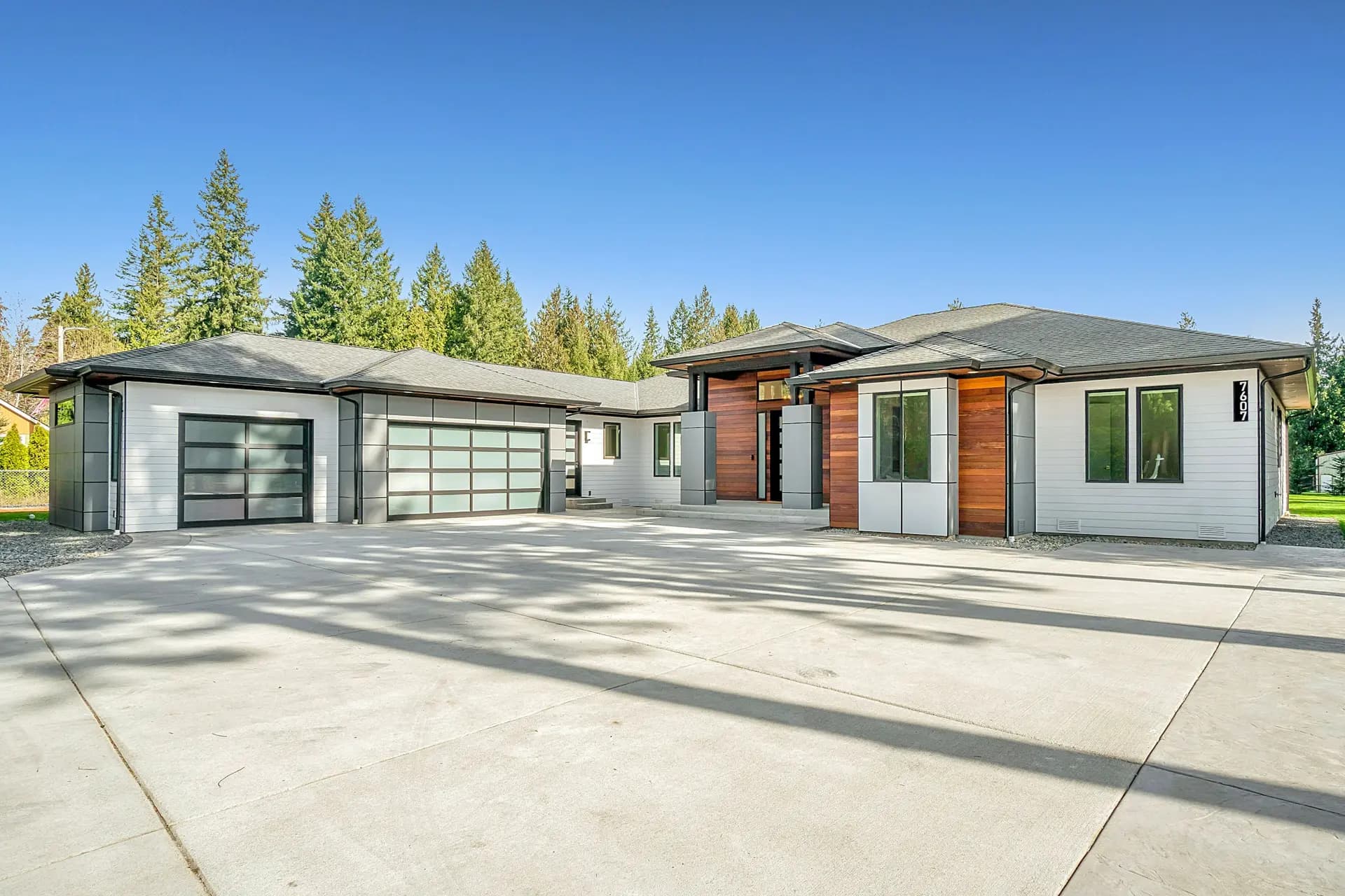 Modern home with a clean concrete driveway